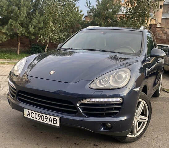 Синий Порше Каен, объемом двигателя 2.97 л и пробегом 300 тыс. км за 19962 $, фото 1 на Automoto.ua