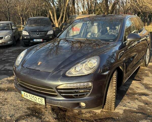Синий Порше Каен, объемом двигателя 3 л и пробегом 220 тыс. км за 23000 $, фото 1 на Automoto.ua