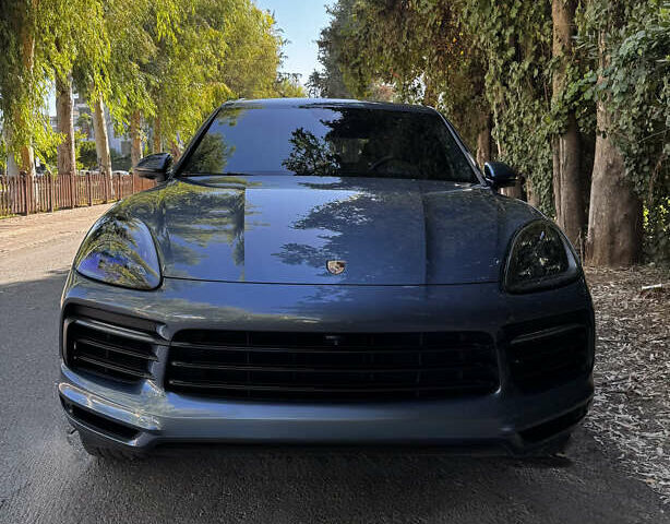 Синий Порше Каен, объемом двигателя 3 л и пробегом 101 тыс. км за 59900 $, фото 1 на Automoto.ua