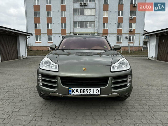 Зеленый Порше Каен, объемом двигателя 4.8 л и пробегом 203 тыс. км за 13500 $, фото 1 на Automoto.ua