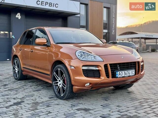 Помаранчевий Порше Cayenne, об'ємом двигуна 4.81 л та пробігом 159 тис. км за 12500 $, фото 1 на Automoto.ua