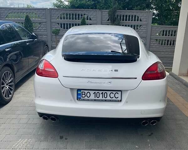 Белый Порше Панамера, объемом двигателя 4.8 л и пробегом 111 тыс. км за 25000 $, фото 1 на Automoto.ua