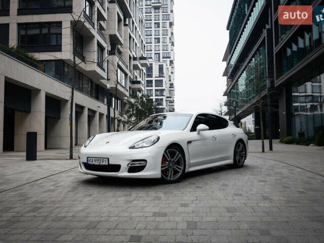Белый Порше Панамера, объемом двигателя 4.81 л и пробегом 129 тыс. км за 26000 $, фото 1 на Automoto.ua