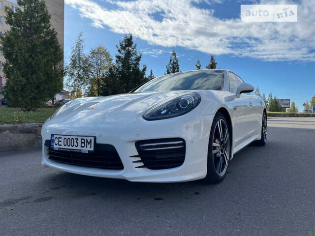 Белый Порше Панамера, объемом двигателя 4.8 л и пробегом 103 тыс. км за 31900 $, фото 1 на Automoto.ua