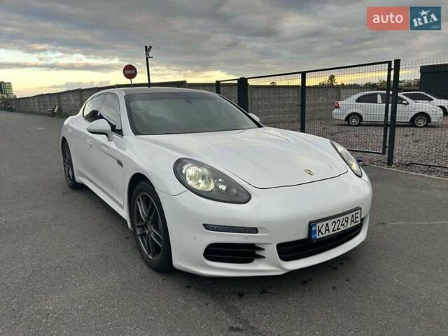 Белый Порше Панамера, объемом двигателя 3.6 л и пробегом 136 тыс. км за 22500 $, фото 1 на Automoto.ua