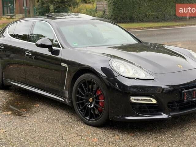 Черный Порше Панамера, объемом двигателя 4.81 л и пробегом 143 тыс. км за 38586 $, фото 1 на Automoto.ua