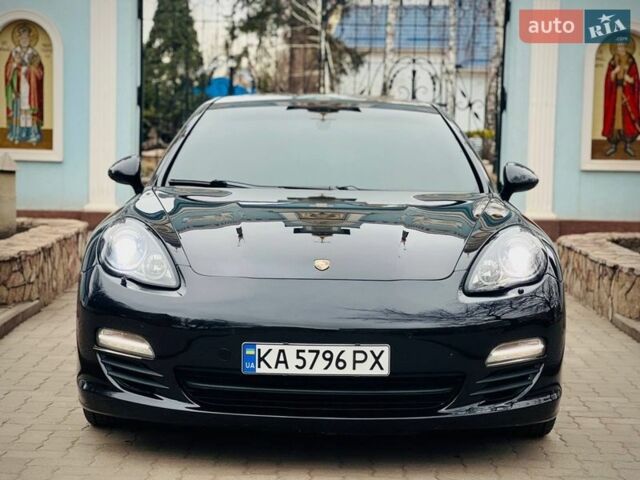 Черный Порше Панамера, объемом двигателя 3 л и пробегом 145 тыс. км за 27900 $, фото 1 на Automoto.ua