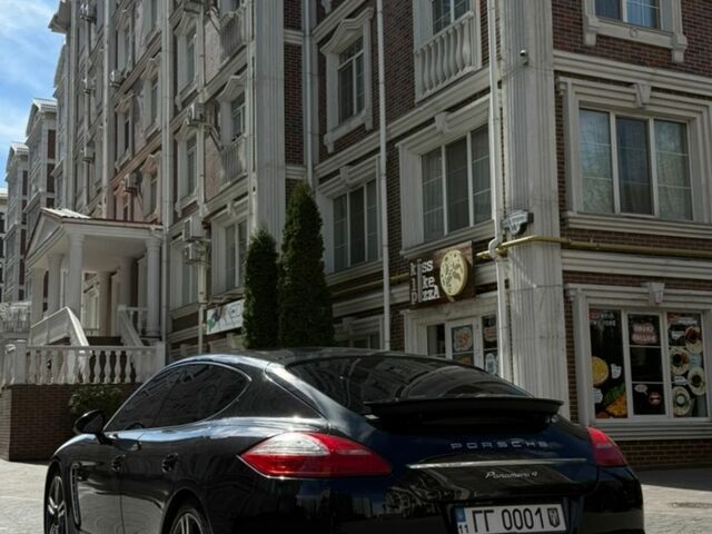 Черный Порше Панамера, объемом двигателя 3.61 л и пробегом 105 тыс. км за 21900 $, фото 1 на Automoto.ua