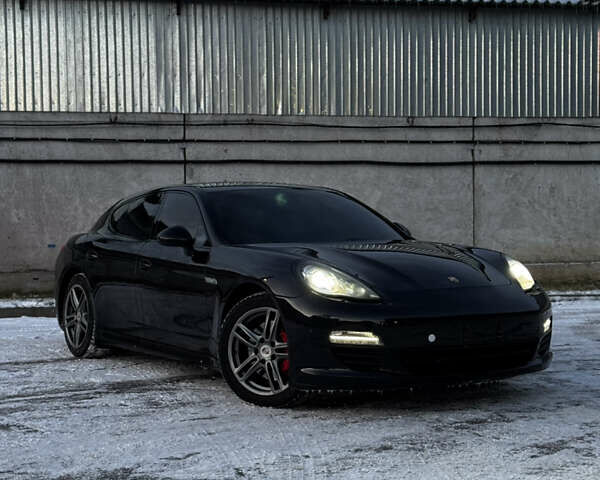 Чорний Порше Panamera, об'ємом двигуна 3 л та пробігом 141 тис. км за 20900 $, фото 1 на Automoto.ua