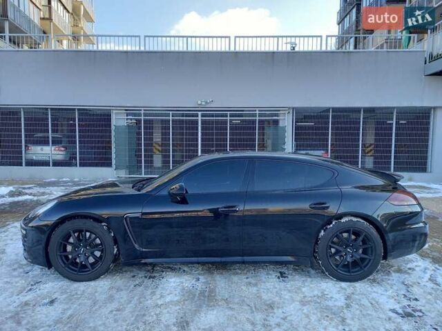 Чорний Порше Panamera, об'ємом двигуна 3.61 л та пробігом 208 тис. км за 22800 $, фото 1 на Automoto.ua