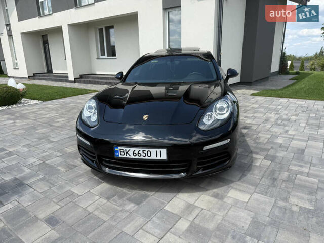 Чорний Порше Panamera, об'ємом двигуна 3 л та пробігом 149 тис. км за 30000 $, фото 1 на Automoto.ua
