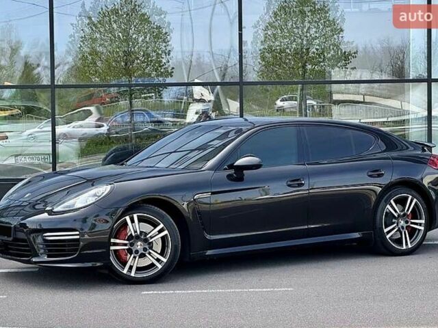 Черный Порше Панамера, объемом двигателя 4.81 л и пробегом 170 тыс. км за 65000 $, фото 1 на Automoto.ua