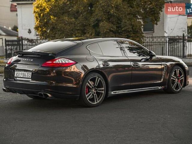 Коричневый Порше Панамера, объемом двигателя 4.81 л и пробегом 142 тыс. км за 25530 $, фото 1 на Automoto.ua