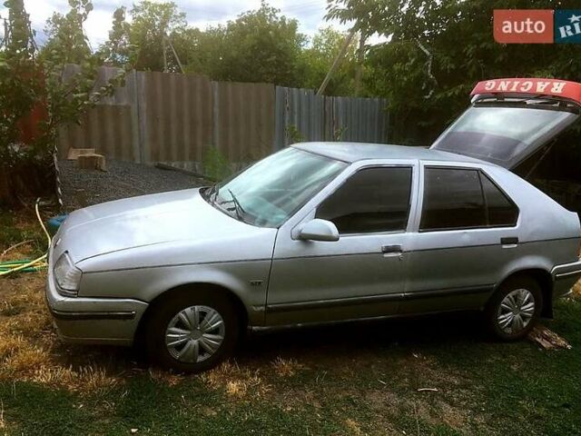 Серый Рено 19, объемом двигателя 1.4 л и пробегом 267 тыс. км за 850 $, фото 1 на Automoto.ua