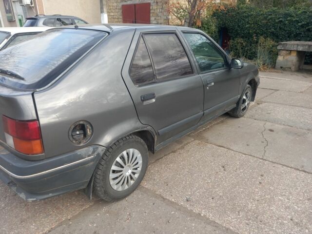 Серый Рено 19, объемом двигателя 1.67 л и пробегом 328 тыс. км за 600 $, фото 1 на Automoto.ua