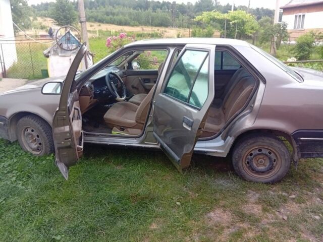 Сірий Рено 19, об'ємом двигуна 1 л та пробігом 2 тис. км за 1164 $, фото 1 на Automoto.ua