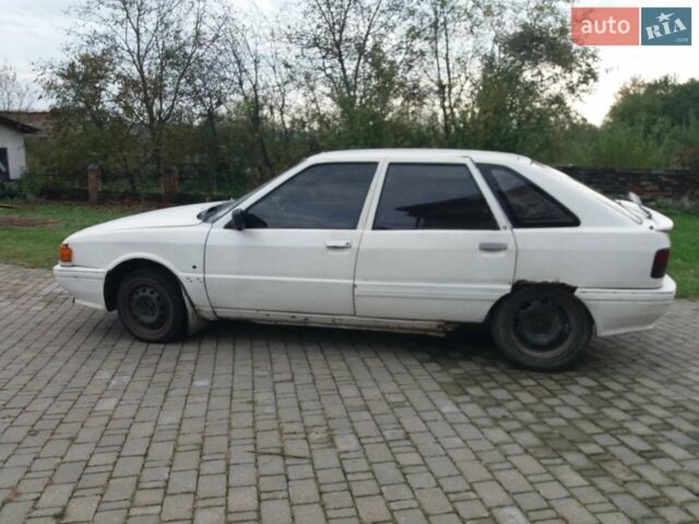 Белый Рено 21, объемом двигателя 1.7 л и пробегом 333 тыс. км за 450 $, фото 1 на Automoto.ua