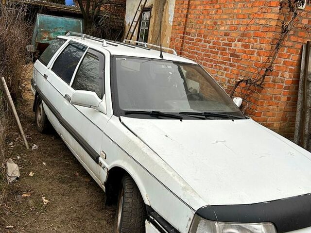 Белый Рено 21, объемом двигателя 1.7 л и пробегом 200 тыс. км за 500 $, фото 1 на Automoto.ua