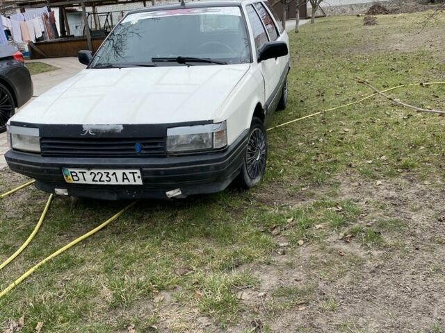 Белый Рено 21, объемом двигателя 2.1 л и пробегом 350 тыс. км за 565 $, фото 1 на Automoto.ua