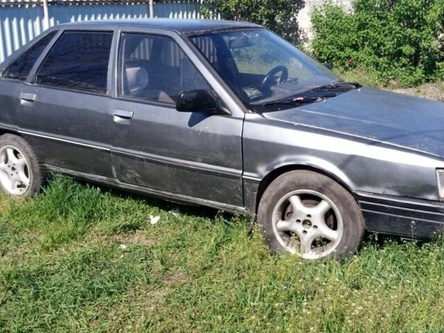 Сірий Рено 21, об'ємом двигуна 2.2 л та пробігом 456 тис. км за 459 $, фото 1 на Automoto.ua