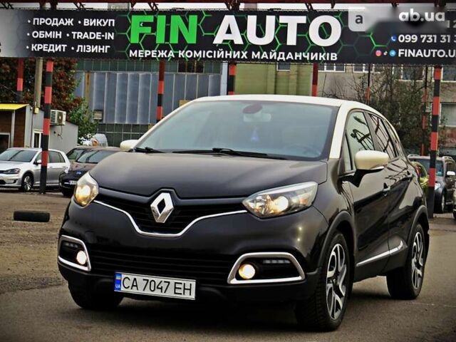 Черный Рено Каптур, объемом двигателя 1.2 л и пробегом 122 тыс. км за 12500 $, фото 1 на Automoto.ua