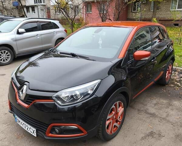 Черный Рено Каптур, объемом двигателя 1.2 л и пробегом 124 тыс. км за 13500 $, фото 1 на Automoto.ua