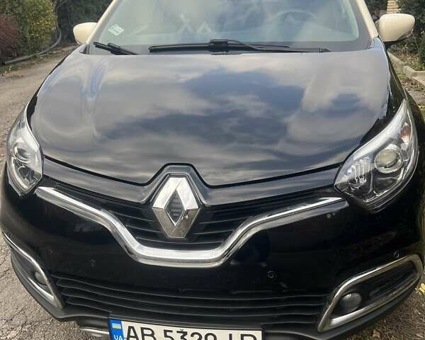 Черный Рено Каптур, объемом двигателя 1.2 л и пробегом 54 тыс. км за 12300 $, фото 1 на Automoto.ua