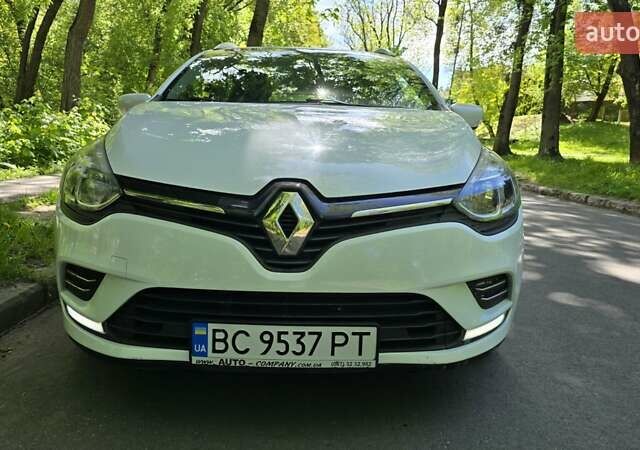 Белый Рено Клио, объемом двигателя 1.5 л и пробегом 210 тыс. км за 9200 $, фото 1 на Automoto.ua