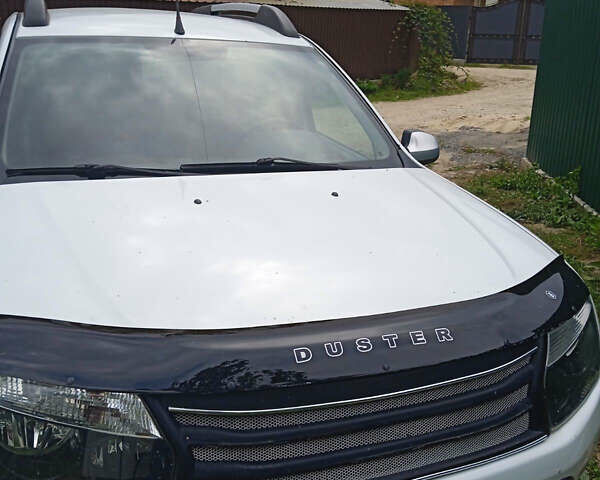 Білий Рено Дастер, об'ємом двигуна 2 л та пробігом 155 тис. км за 10500 $, фото 1 на Automoto.ua