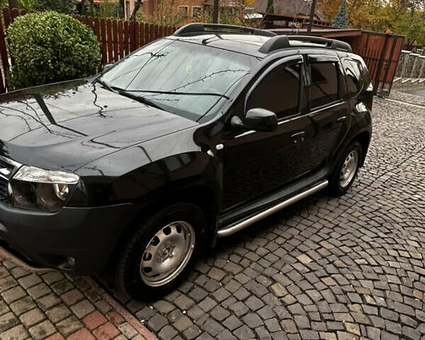 Черный Рено Дастер, объемом двигателя 1.46 л и пробегом 171 тыс. км за 8900 $, фото 1 на Automoto.ua