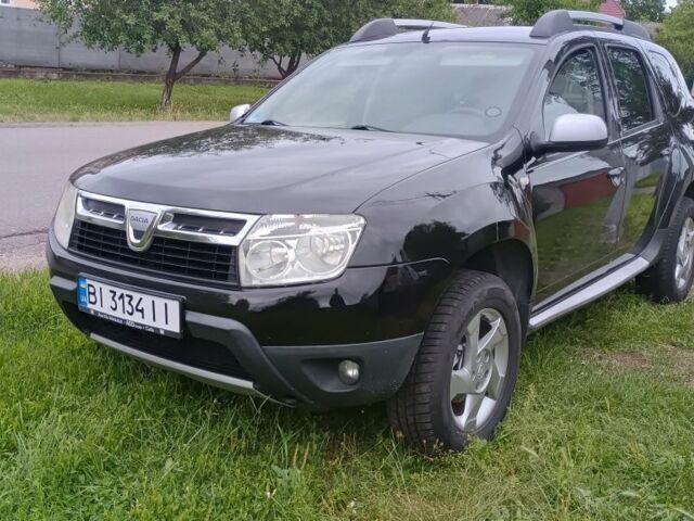 Черный Рено Дастер, объемом двигателя 1.6 л и пробегом 166 тыс. км за 8000 $, фото 1 на Automoto.ua