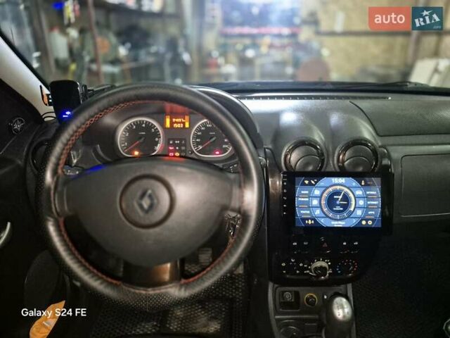 Черный Рено Дастер, объемом двигателя 1.6 л и пробегом 94 тыс. км за 8900 $, фото 1 на Automoto.ua