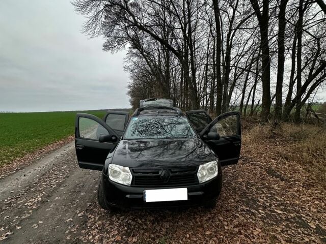 Черный Рено Дастер, объемом двигателя 1.6 л и пробегом 180 тыс. км за 6650 $, фото 1 на Automoto.ua