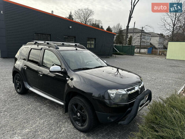 Черный Рено Дастер, объемом двигателя 1.6 л и пробегом 159 тыс. км за 8800 $, фото 1 на Automoto.ua