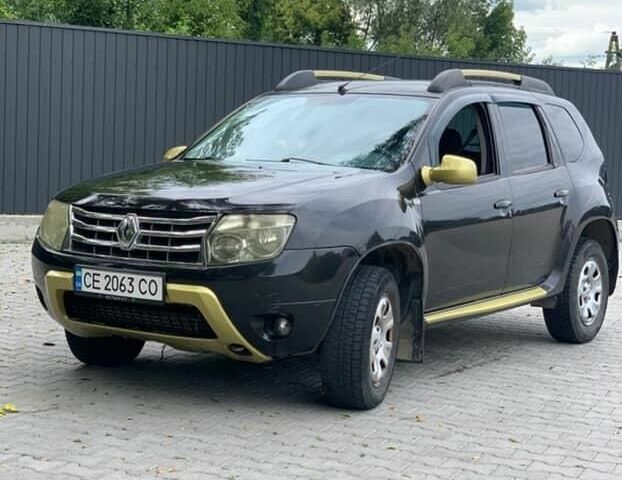 Черный Рено Дастер, объемом двигателя 1.5 л и пробегом 392 тыс. км за 7800 $, фото 1 на Automoto.ua