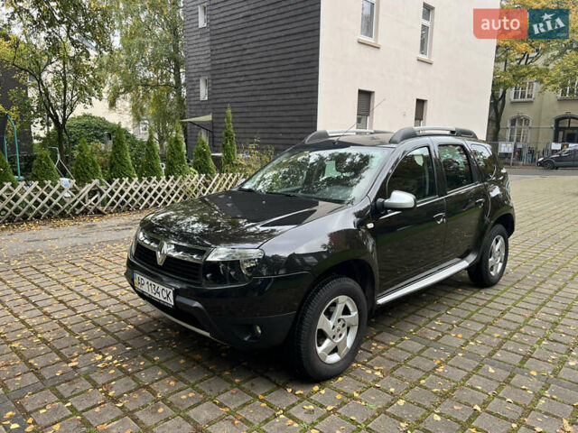 Черный Рено Дастер, объемом двигателя 1.6 л и пробегом 140 тыс. км за 9200 $, фото 1 на Automoto.ua