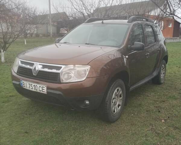 Коричневый Рено Дастер, объемом двигателя 1.6 л и пробегом 230 тыс. км за 7000 $, фото 1 на Automoto.ua