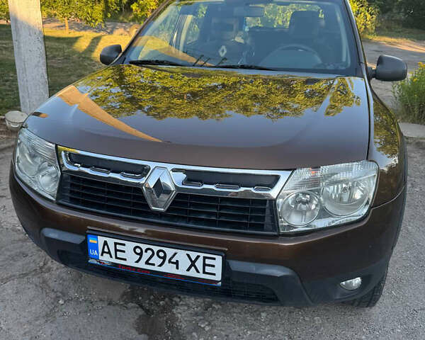 Коричневый Рено Дастер, объемом двигателя 2 л и пробегом 222 тыс. км за 8100 $, фото 1 на Automoto.ua