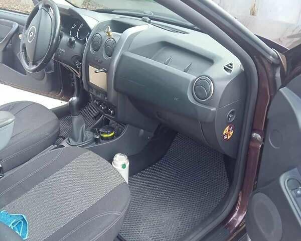 Коричневый Рено Дастер, объемом двигателя 1.6 л и пробегом 101 тыс. км за 11800 $, фото 1 на Automoto.ua