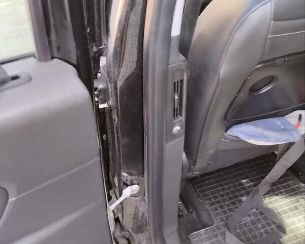 Черный Рено Гранд Сценик, объемом двигателя 1.46 л и пробегом 230 тыс. км за 9800 $, фото 1 на Automoto.ua