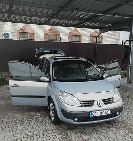 Серый Рено Гранд Сценик, объемом двигателя 2 л и пробегом 250 тыс. км за 4400 $, фото 1 на Automoto.ua