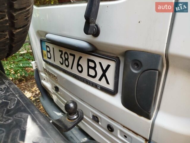 Белый Рено Кенгу, объемом двигателя 1.2 л и пробегом 220 тыс. км за 1500 $, фото 1 на Automoto.ua