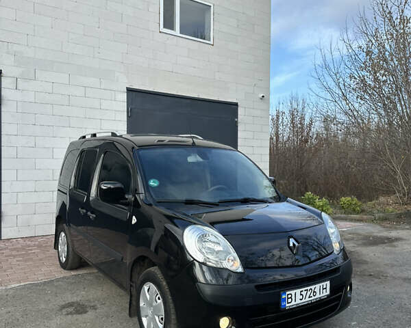 Черный Рено Кенгу, объемом двигателя 1.6 л и пробегом 190 тыс. км за 7199 $, фото 1 на Automoto.ua