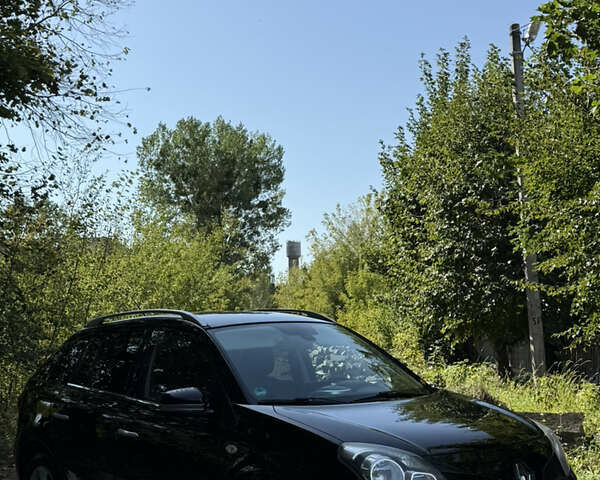 Черный Рено Колеос, объемом двигателя 2 л и пробегом 199 тыс. км за 8150 $, фото 1 на Automoto.ua
