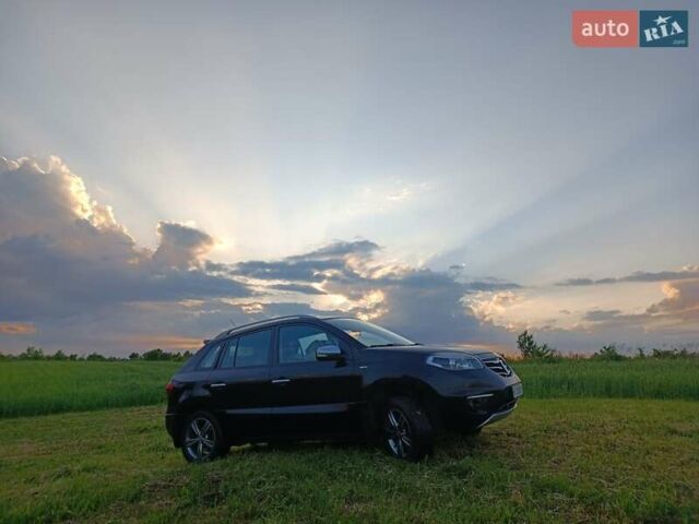 Черный Рено Колеос, объемом двигателя 2.49 л и пробегом 225 тыс. км за 9999 $, фото 1 на Automoto.ua