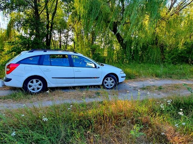 Белый Рено Лагуна, объемом двигателя 1.9 л и пробегом 320 тыс. км за 4500 $, фото 1 на Automoto.ua
