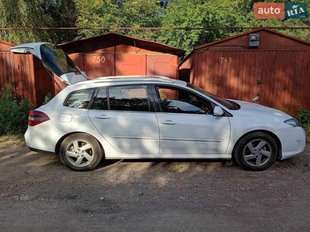 Білий Рено Лагуна, об'ємом двигуна 1.46 л та пробігом 264 тис. км за 6700 $, фото 1 на Automoto.ua