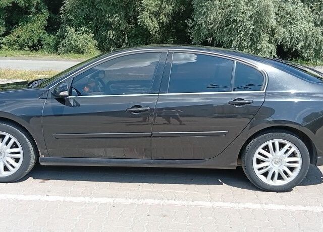 Чорний Рено Лагуна, об'ємом двигуна 2 л та пробігом 263 тис. км за 59997 $, фото 1 на Automoto.ua