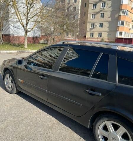 Черный Рено Лагуна, объемом двигателя 2.19 л и пробегом 300 тыс. км за 3100 $, фото 1 на Automoto.ua