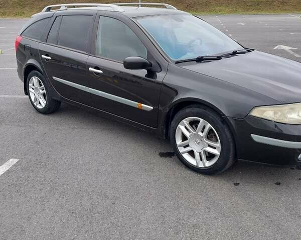 Черный Рено Лагуна, объемом двигателя 2 л и пробегом 327 тыс. км за 3500 $, фото 1 на Automoto.ua